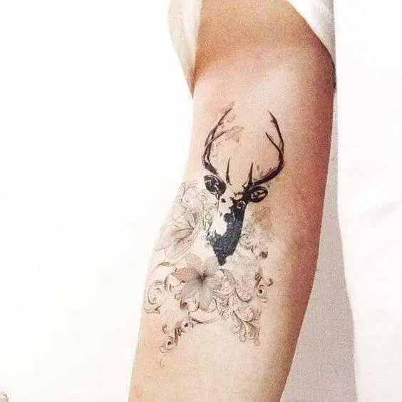 A selection of deer tattoos for women