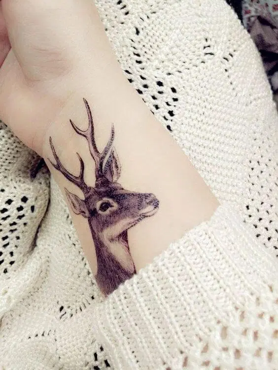 A selection of deer tattoos for women