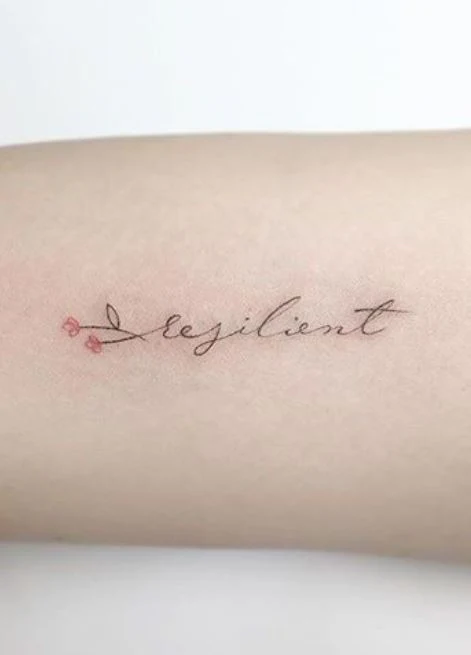 Tattoo inscription on the arm