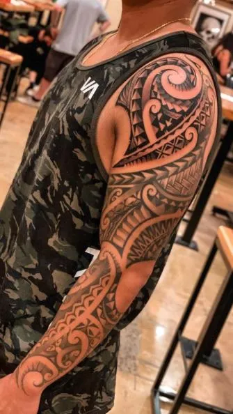 ETHNIC TATTOO ON THE ARM