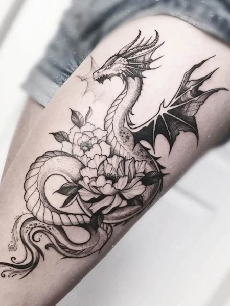 Dragon tattoo on legs