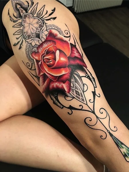 Tattoos with roses on legs