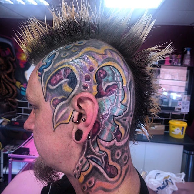 Bioorganic tattoos on the head