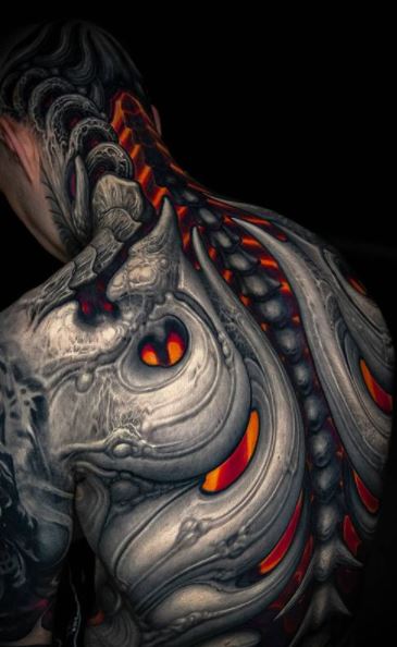 Biomechanical tattoos on the back