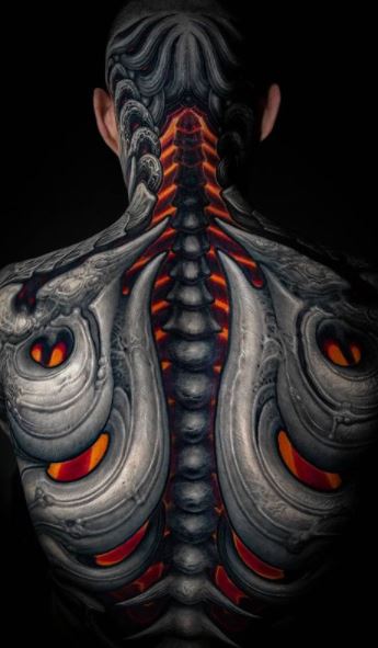 Biomechanical tattoos on the back