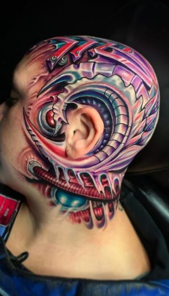 Colorful biomechanical tattoos