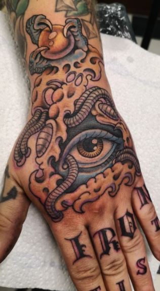 Colorful biomechanical tattoos