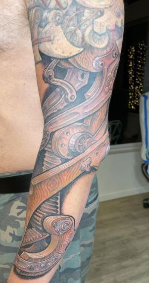 Colorful biomechanical tattoos