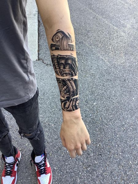 Biomechanical tattoos on the arm