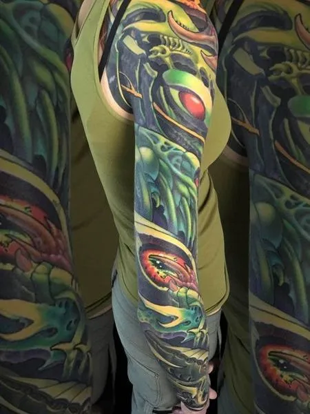 Colorful biomechanical tattoos