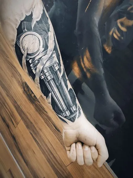 Biomechanical tattoos on the forearm