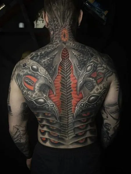 Biomechanical tattoos on the back