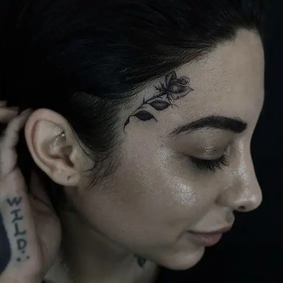 Floral tattoos are a simple and beautiful way to decorate the perimeter of your face.