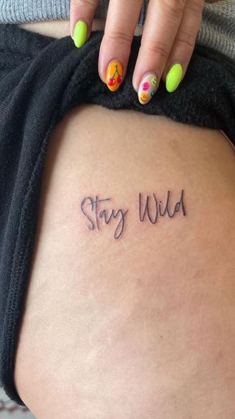 Tattoo that says Stay Wild