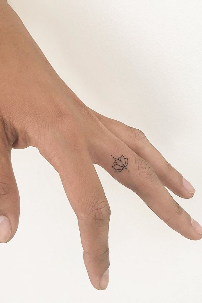 Small hidden minimalist tattoos on fingers