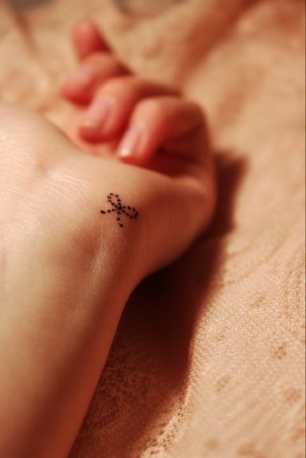 Small Tattoo in the form of a bow