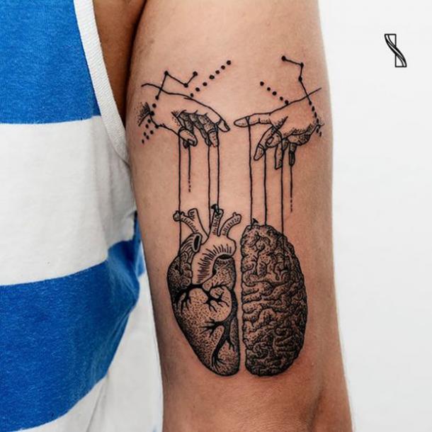 Tattoo Heart and Brain on doll strings.