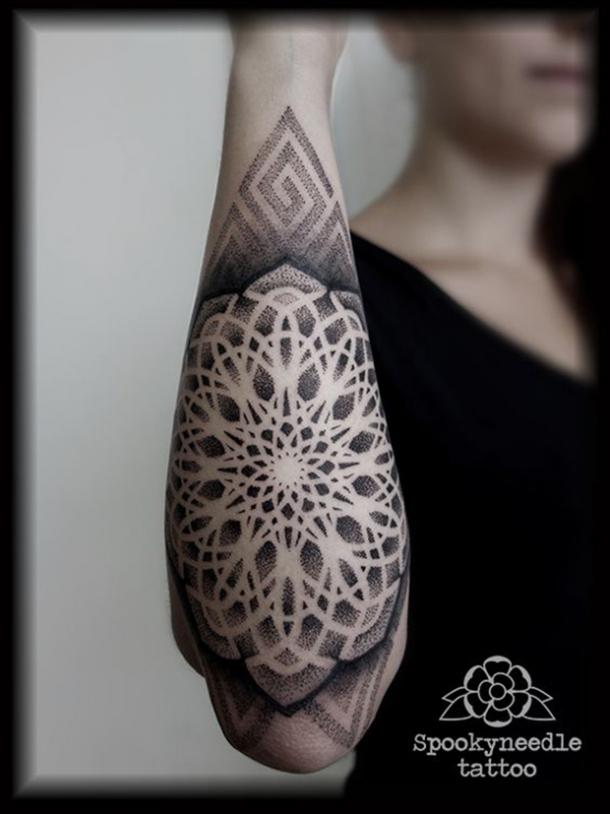 An elaborate mandala tattoo.