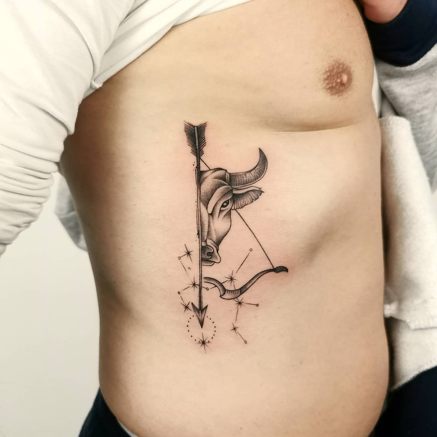 Sagittarius tattoo ideas with bow and arrow