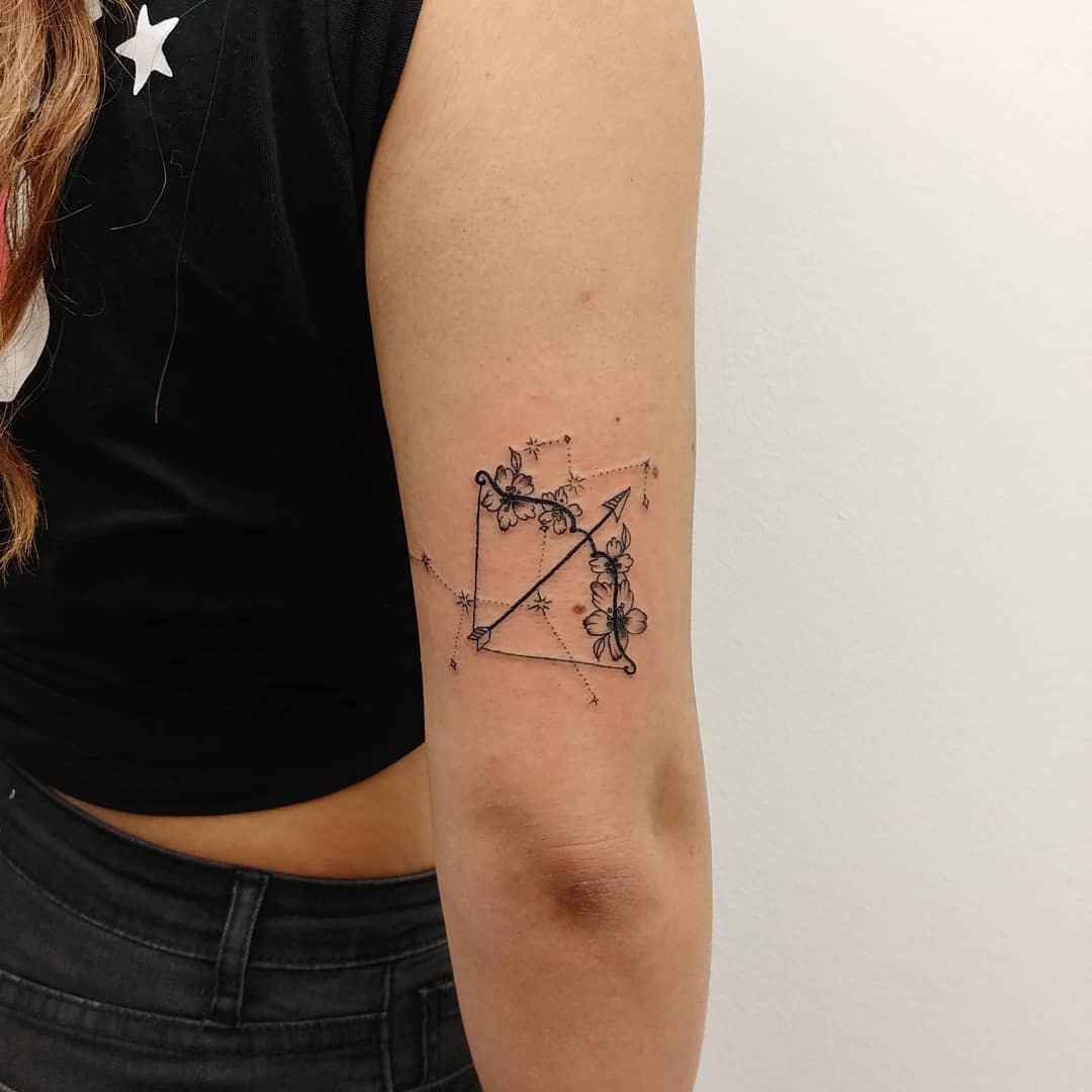 Sagittarius tattoo ideas with bow and arrow