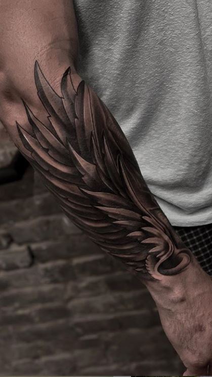 Tattoos of angel wings on the arm