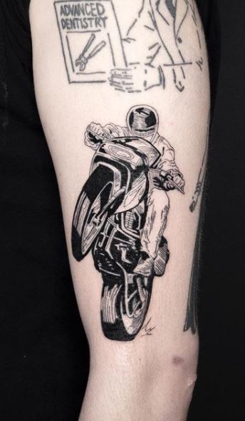 Motorcycle tattoos on the arm