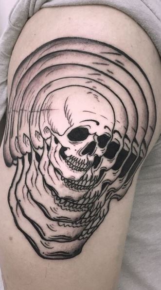 Skull tattoos on the arm