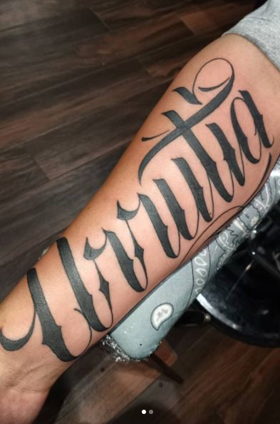 Tattoo on your arm with a name