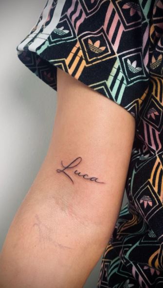 Tattoo on your arm with a name