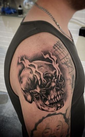 Skull tattoos on the arm