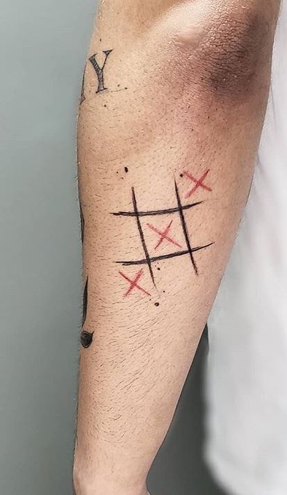 Simple tattoos on the arm