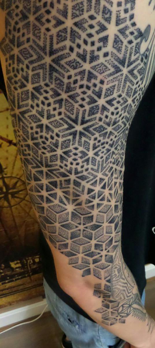 Sophisticated cube tattoo design on the arm