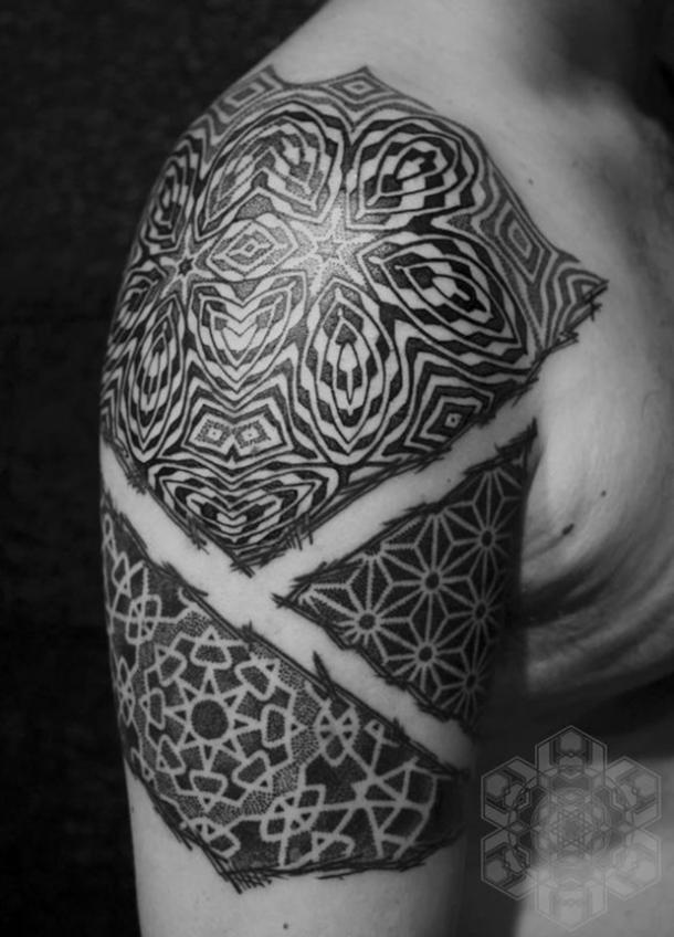 Three patterned sections on shoulder and arm