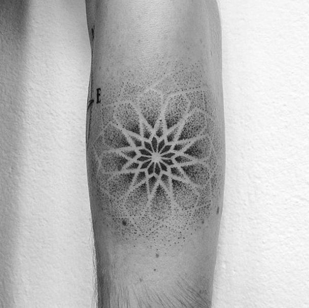 Tattoo Expanding floral pattern created by dots