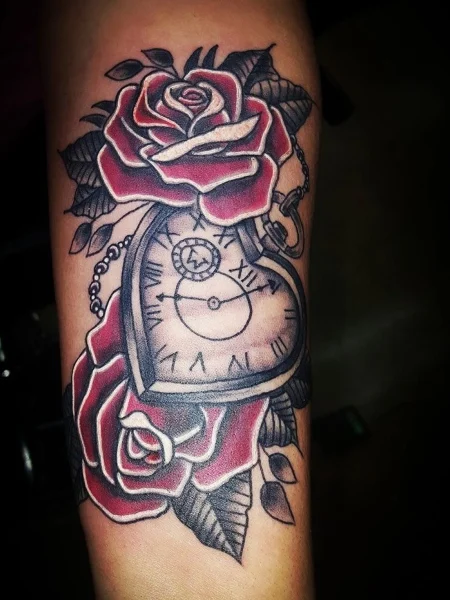 Heart-shaped clock tattoo