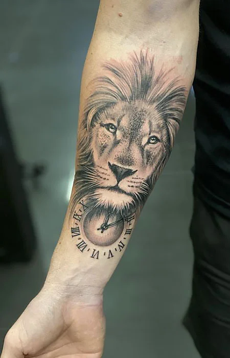 Tattoo of a lion with a clock