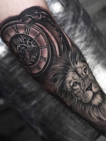 Tattoo of a lion with a clock