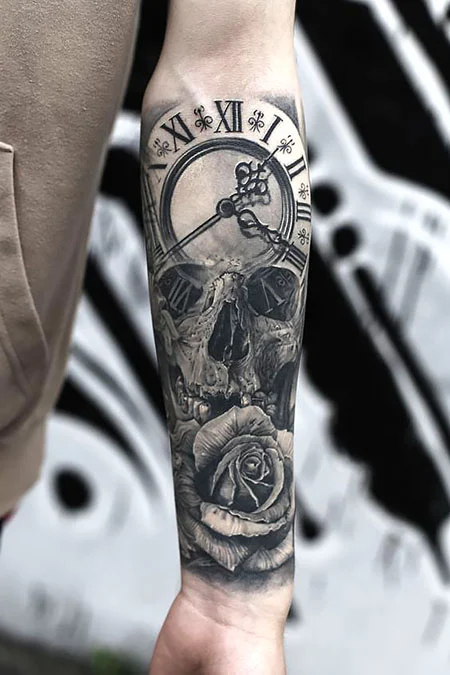 Tattoo of a skull with a clock