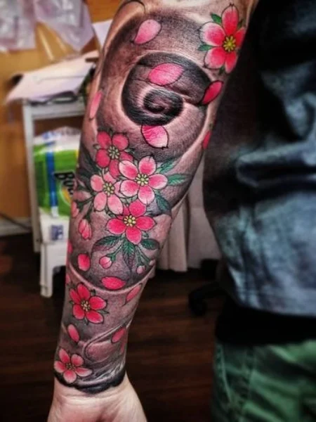 Tattoo flowers on the arm