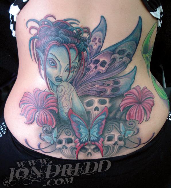 Fantasy tattoo on the lower back