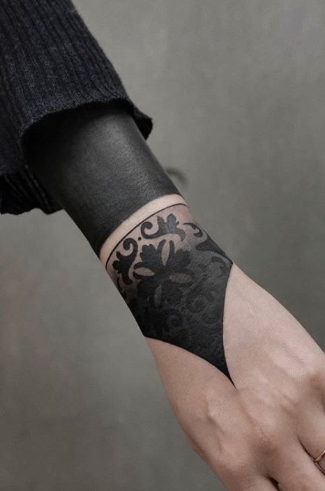 Blackwork tattoo on the arm