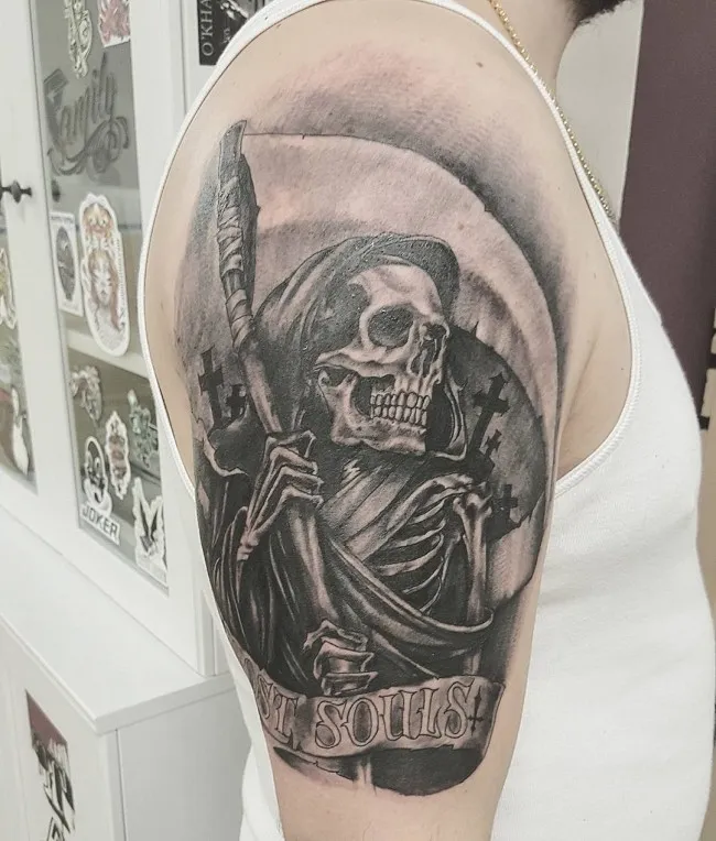 Tattoo of the Grim Reaper on the Shoulder