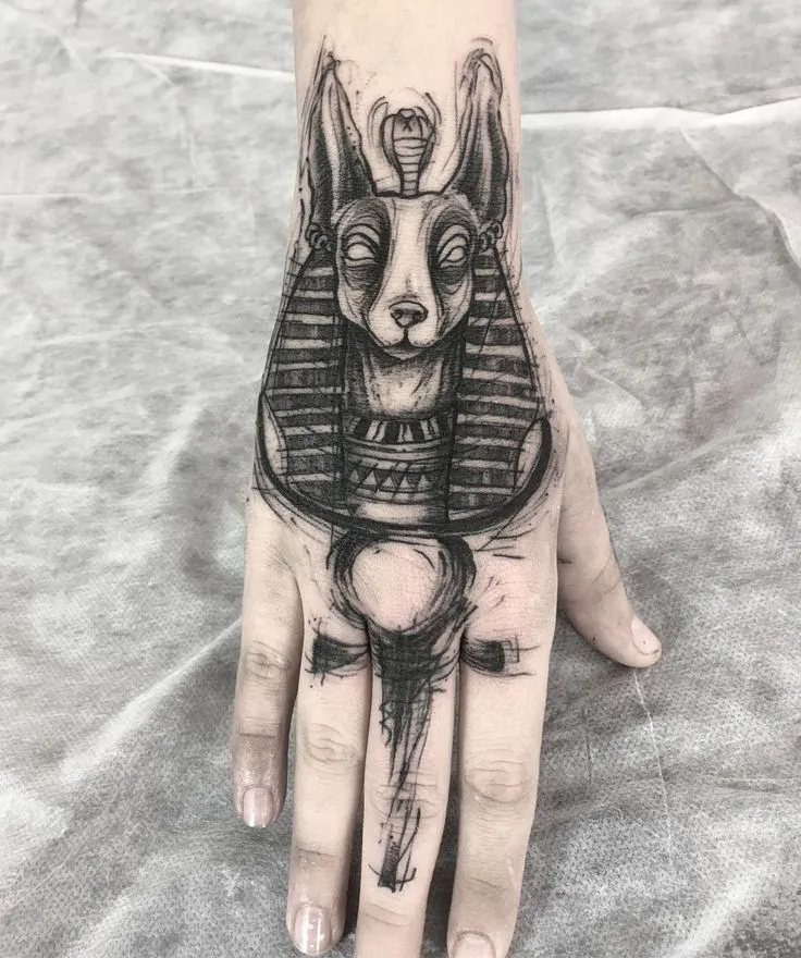 Tattoo of Anubis on the arm