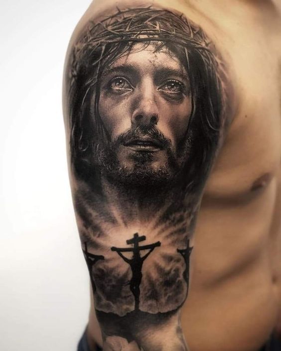 Tattoo of Jesus on the shoulder