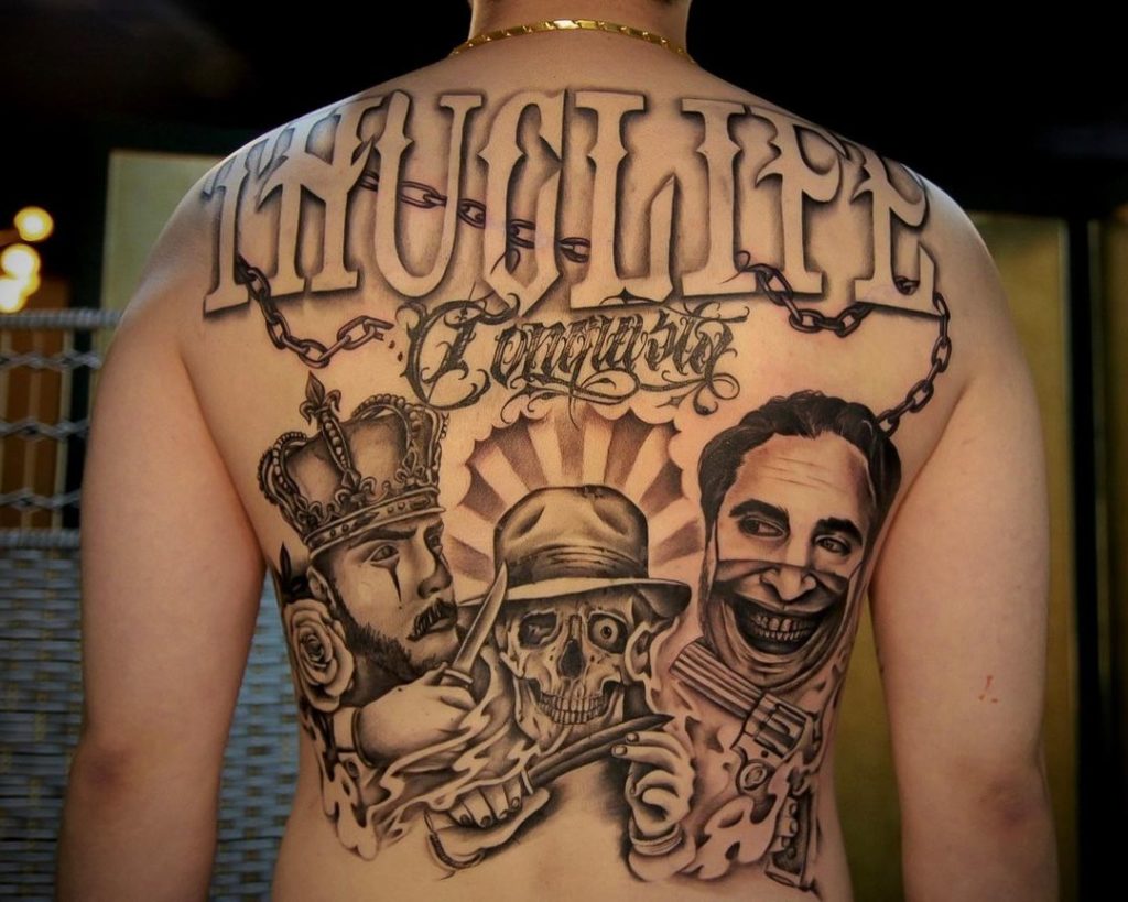 Chicano-style tattoo on the back