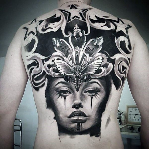 chicano-style tattoo on the entire back