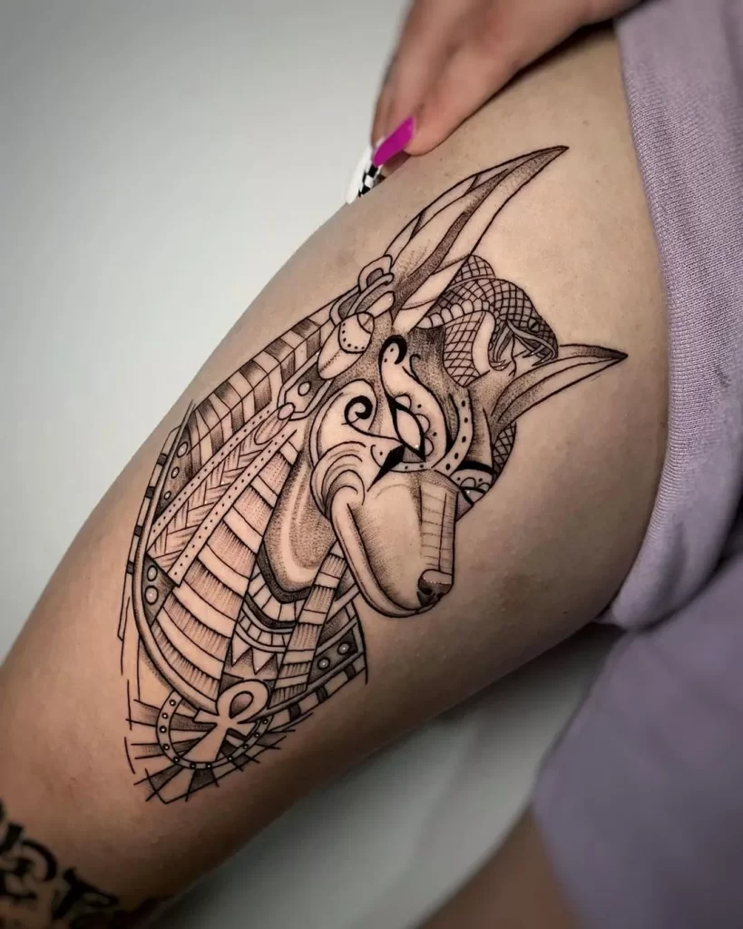 Tattoo of Anubis on the leg