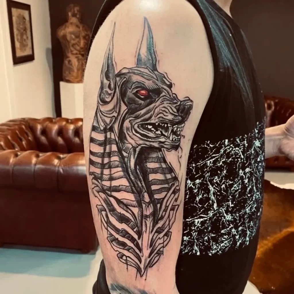 Tattoo of Anubis on the shoulder