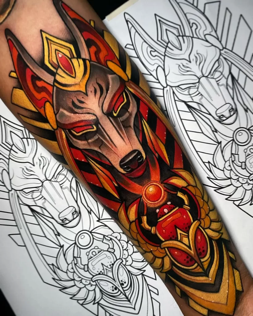 Anubis tattoo on his arm