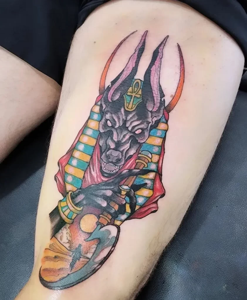 Tattoo of Anubis on the leg